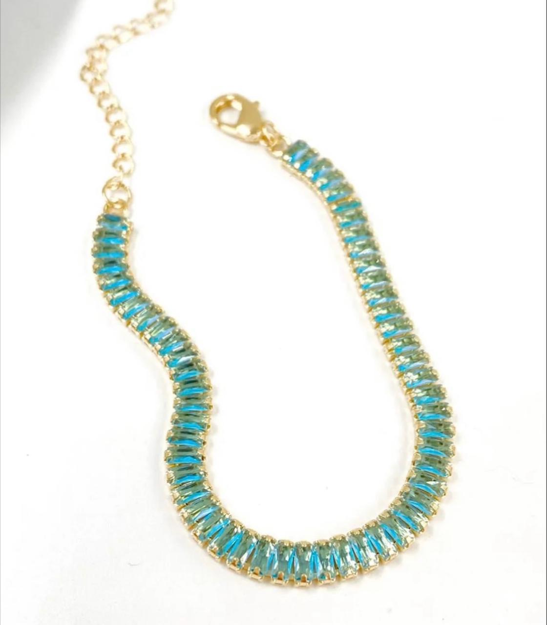 Pulseira de zirconias azuis folhada a ouro 18k