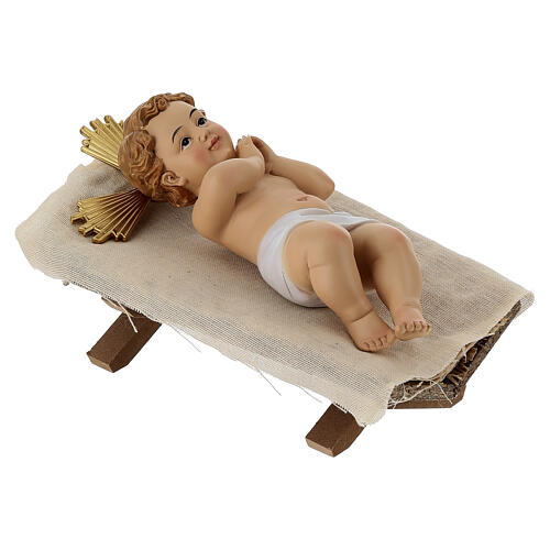 Niño Jesús con cuna de madera 25 cm