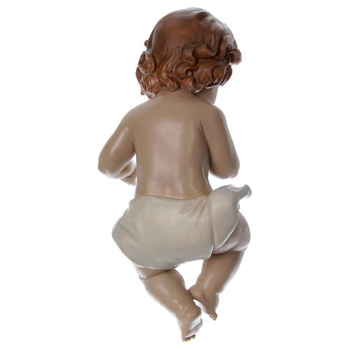 Niño Jesús de resina con paño h real 33 cm