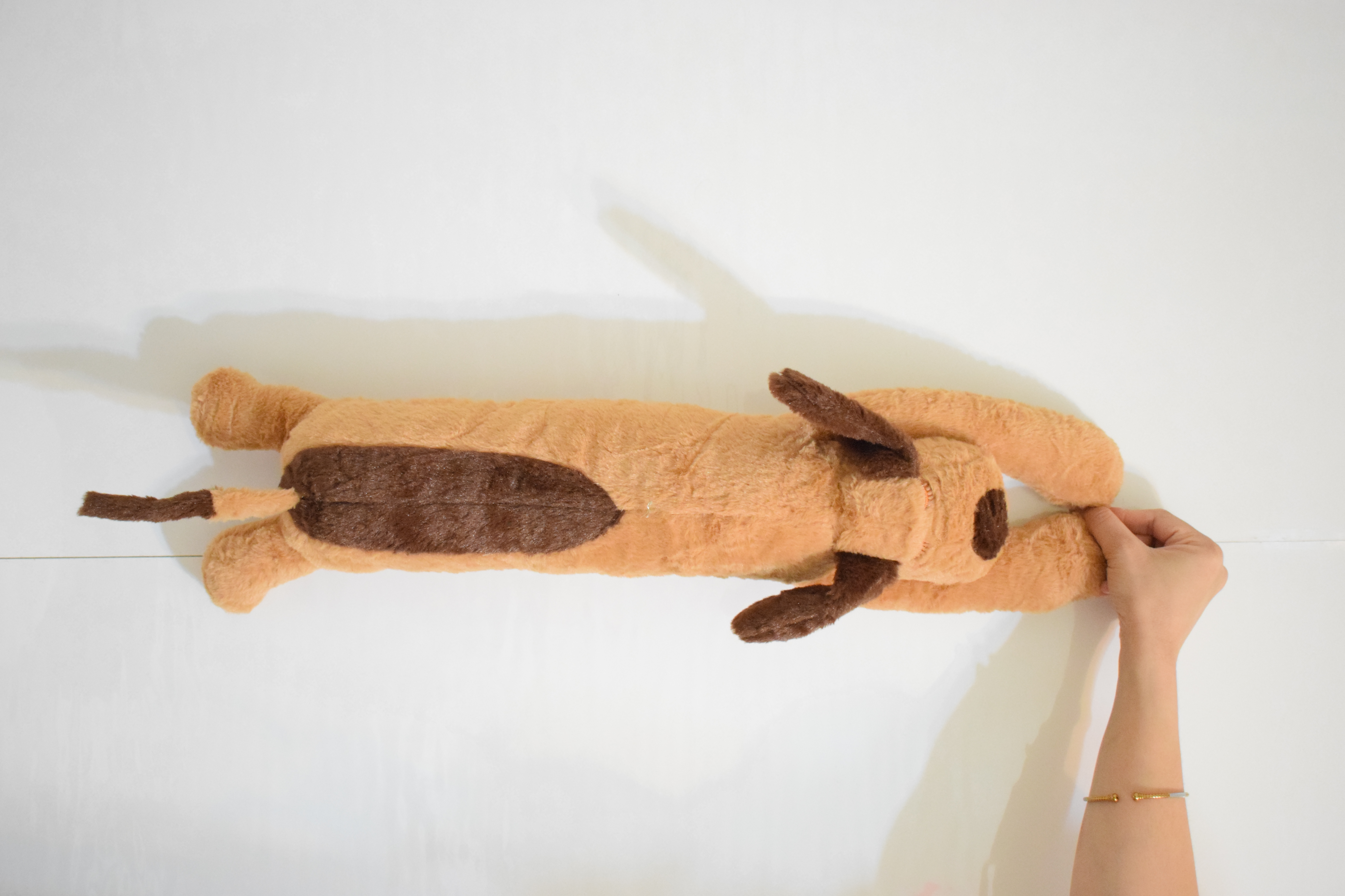 Long Sleeping Dog Plush Toy