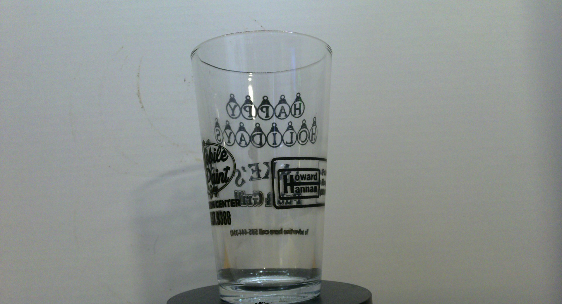 2 advertisers SEASONAL Pint Glass APRX. 16 oz glass