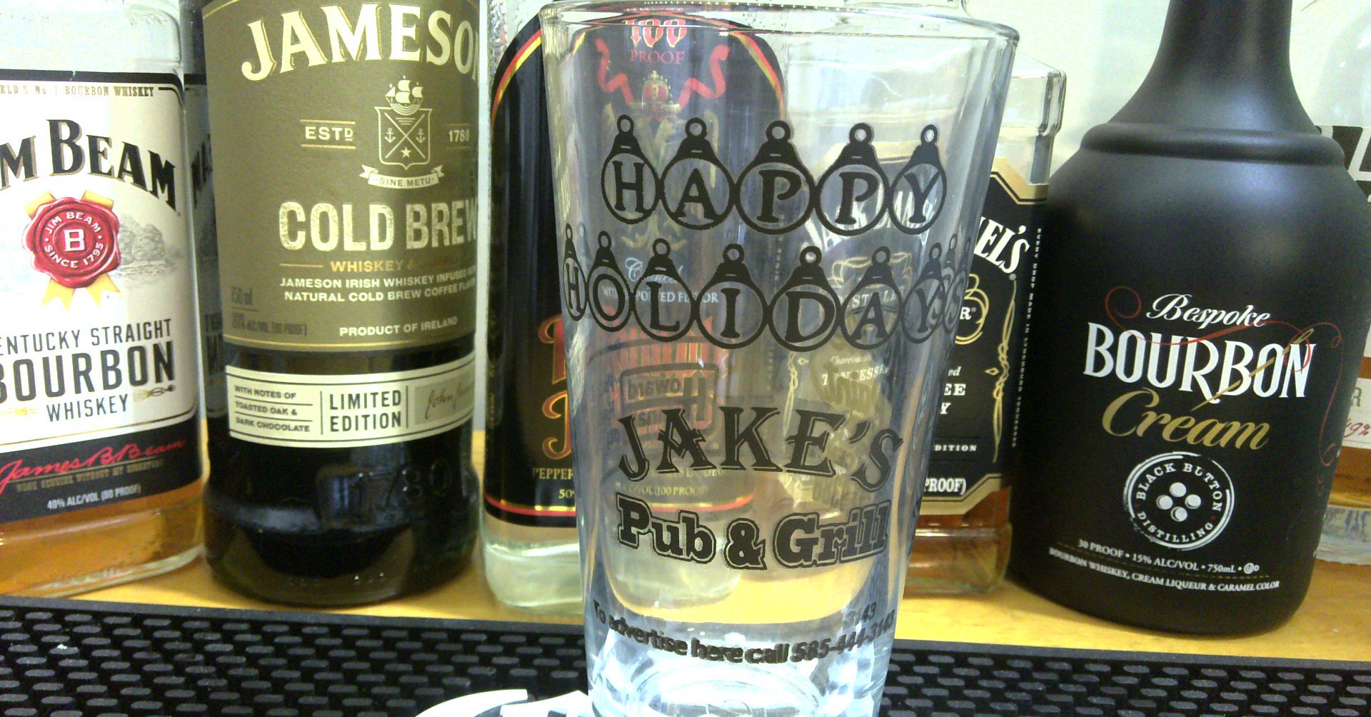 2 advertisers SEASONAL Pint Glass APRX. 16 oz glass 