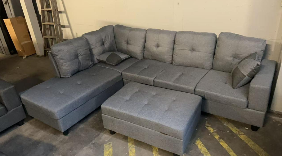 Grey sectional couch with storage ottoman