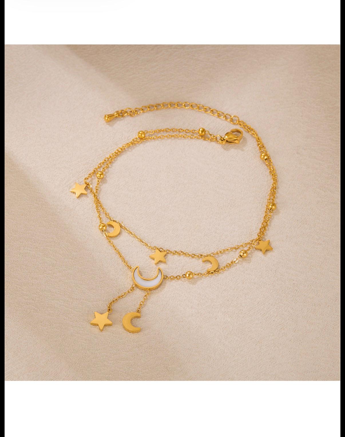 Collier doré à pendentifs lunaires