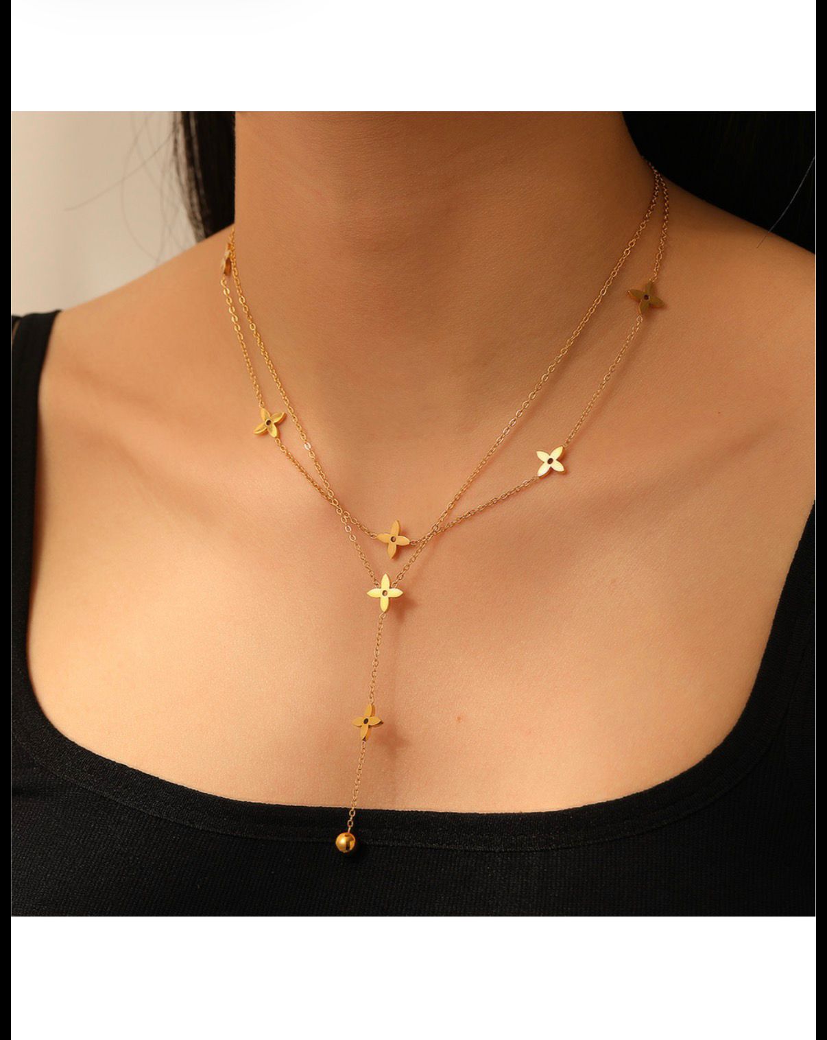 Collier doré à pendentifs étoiles