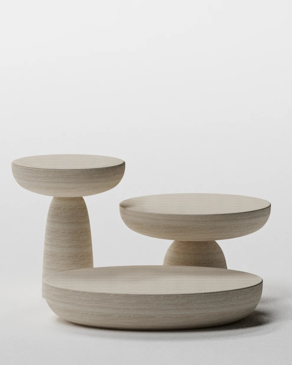 Ensemble de tables basses en travertin aux formes monumentales
