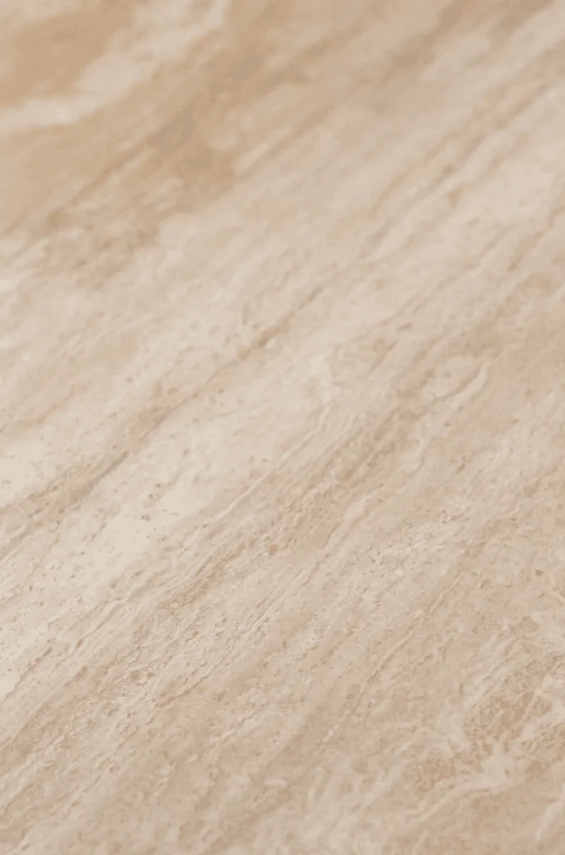 Table de salle à manger ronde en travertin à pieds en forme de sablier Zoey