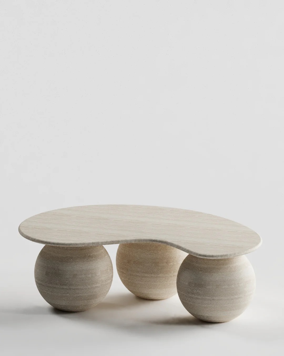 Sculpted Pebble Table basse en travertin