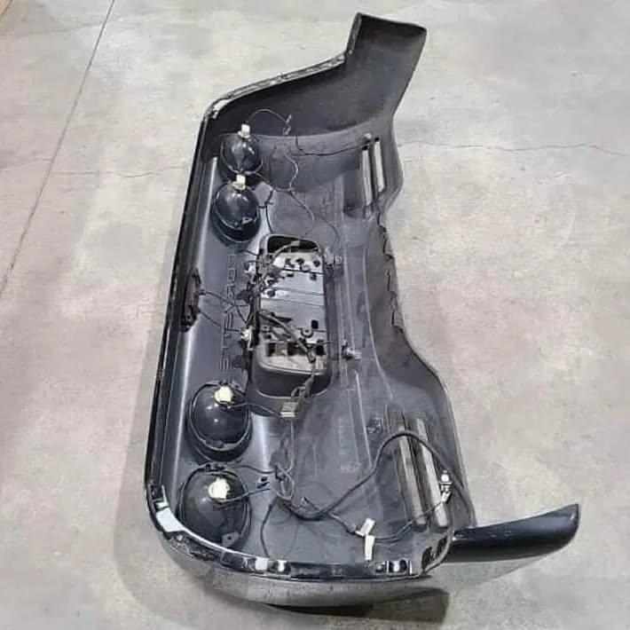 Rear bumper with light mounts