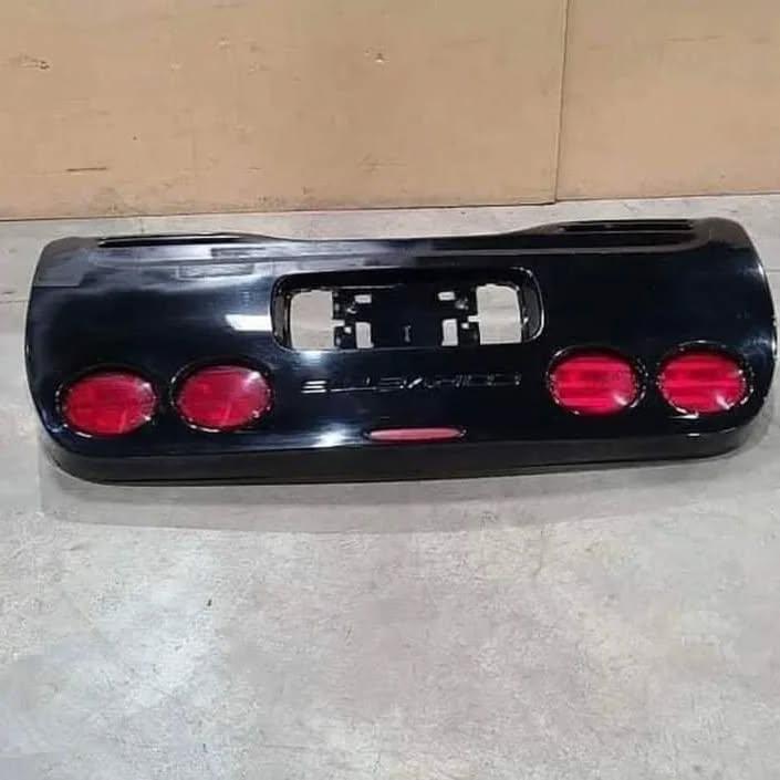 Rear bumper with light mounts