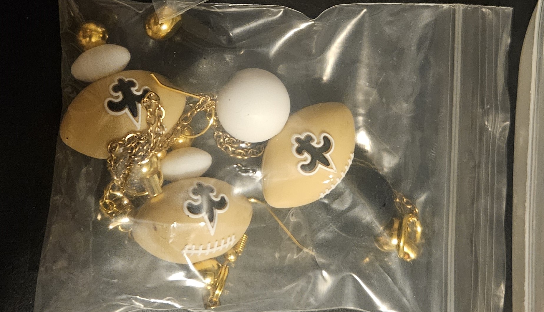 Saints branded earrings and necklace set