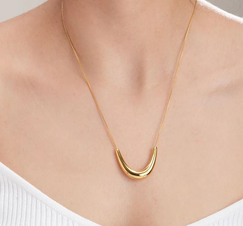 Elegant Gold Crescent Necklace