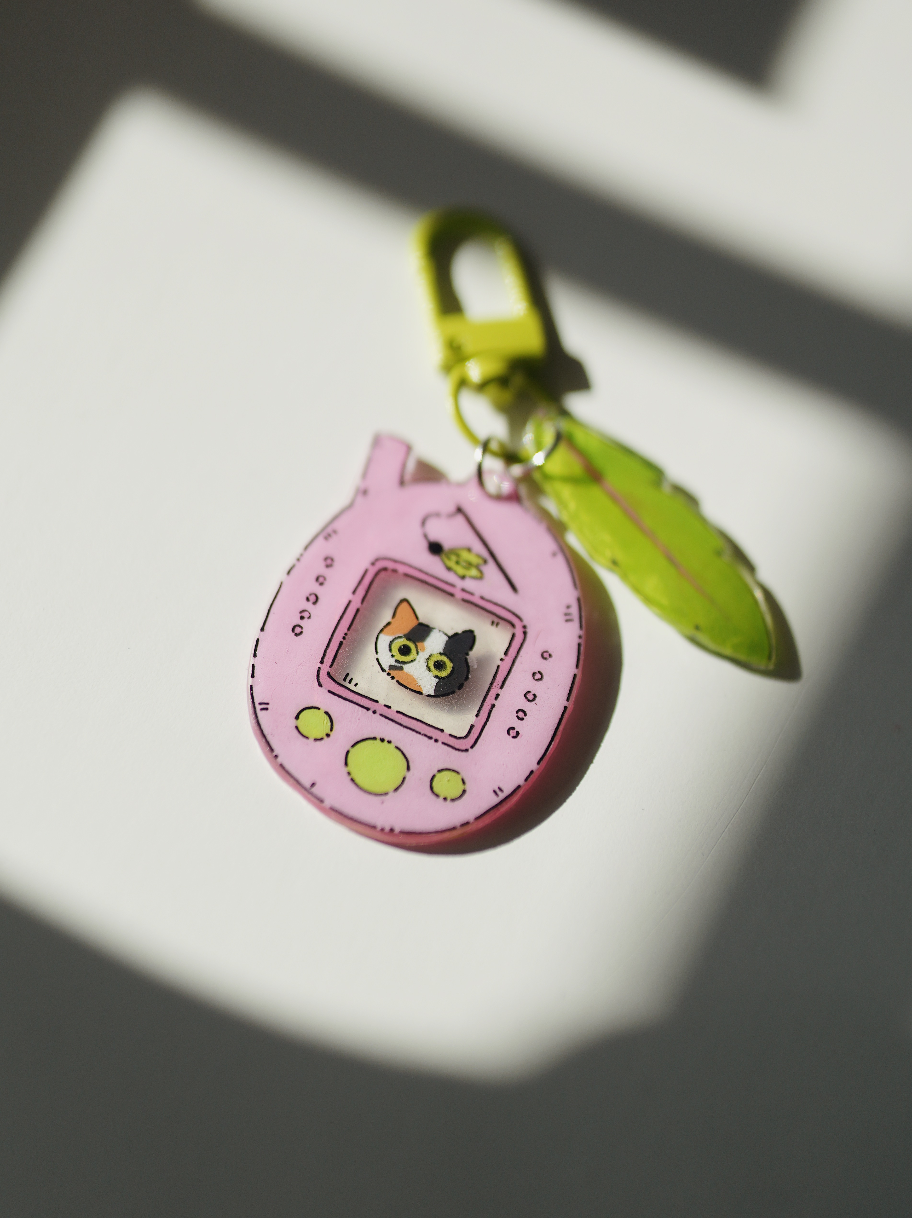 Raktų pakabukas su Tamagotchi dėmėtu kačiuku