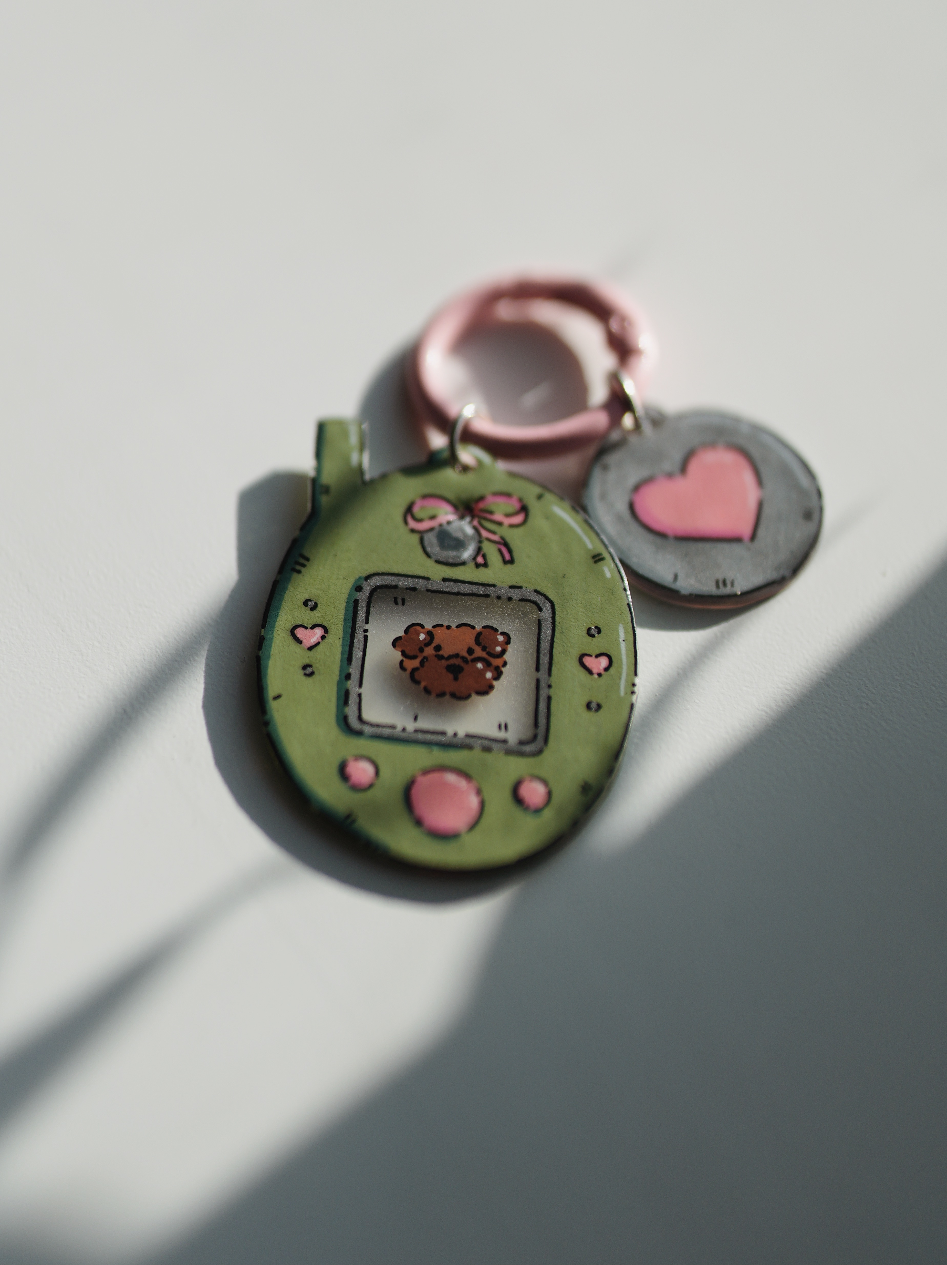 Raktų pakabukas su Tamagotchi garbanotu šuniuku