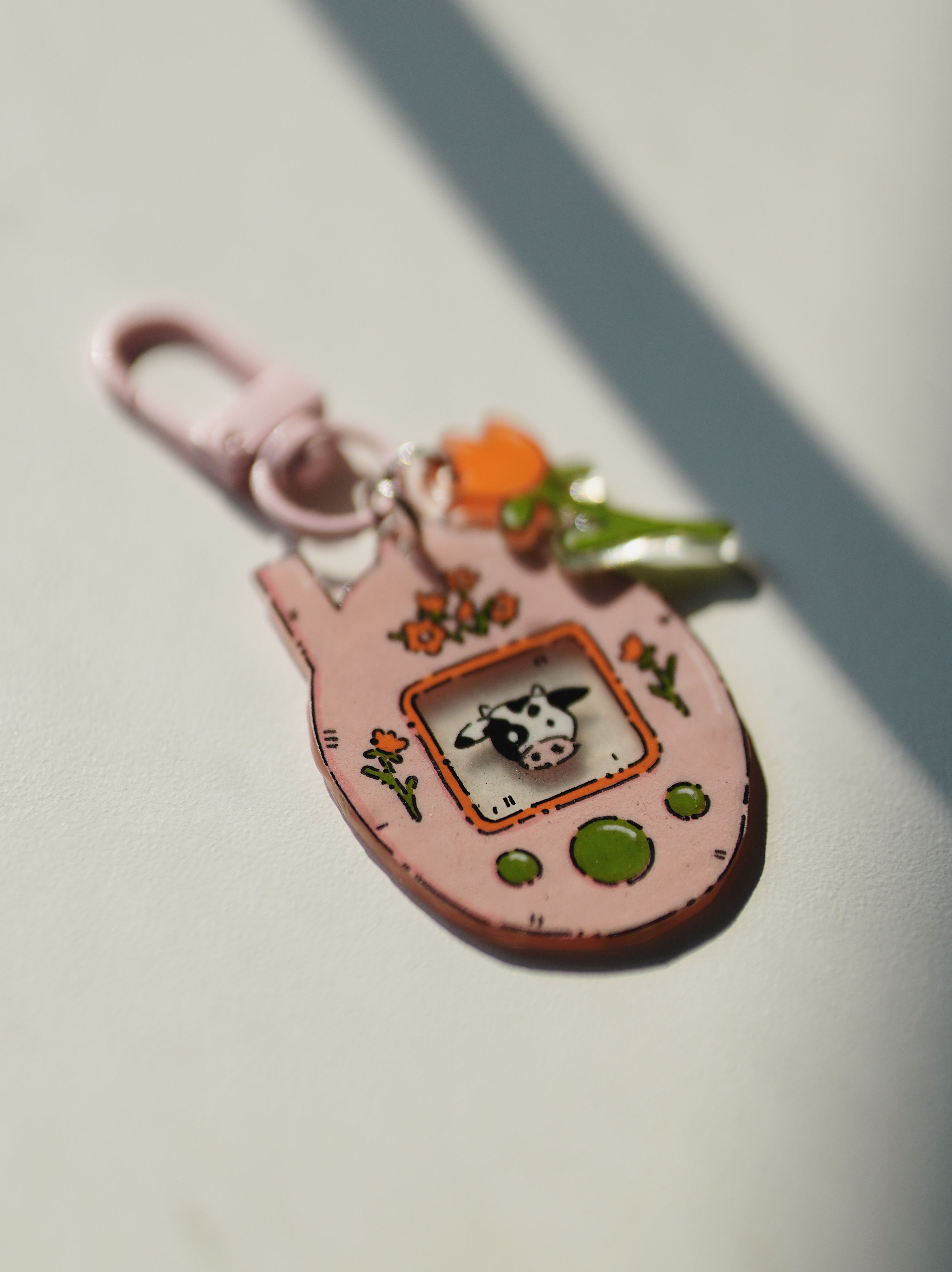 Raktų pakabukas su Tamagotchi karvute