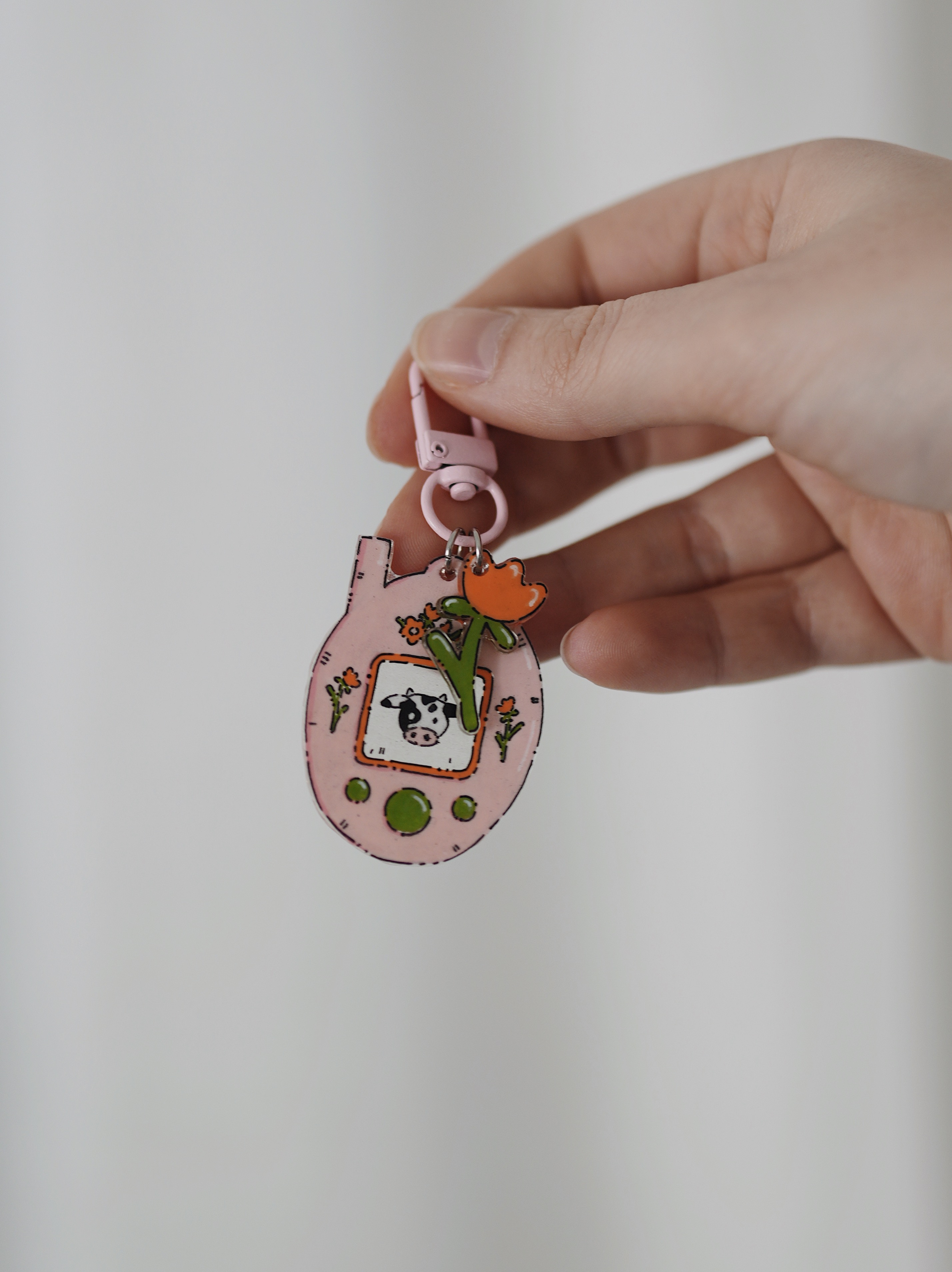 Raktų pakabukas su Tamagotchi karvute