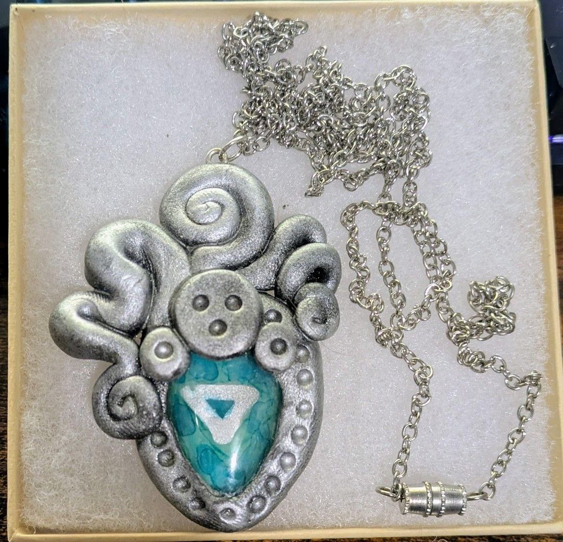 Handcrafted Silver Polymer Clay Pendant Necklace with Water Symbol Cabochon
