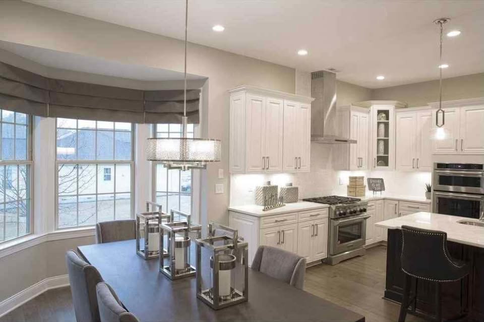 Mingle Collection 4-Light Brushed Nickel Pendant with Etched Parchment Glass 