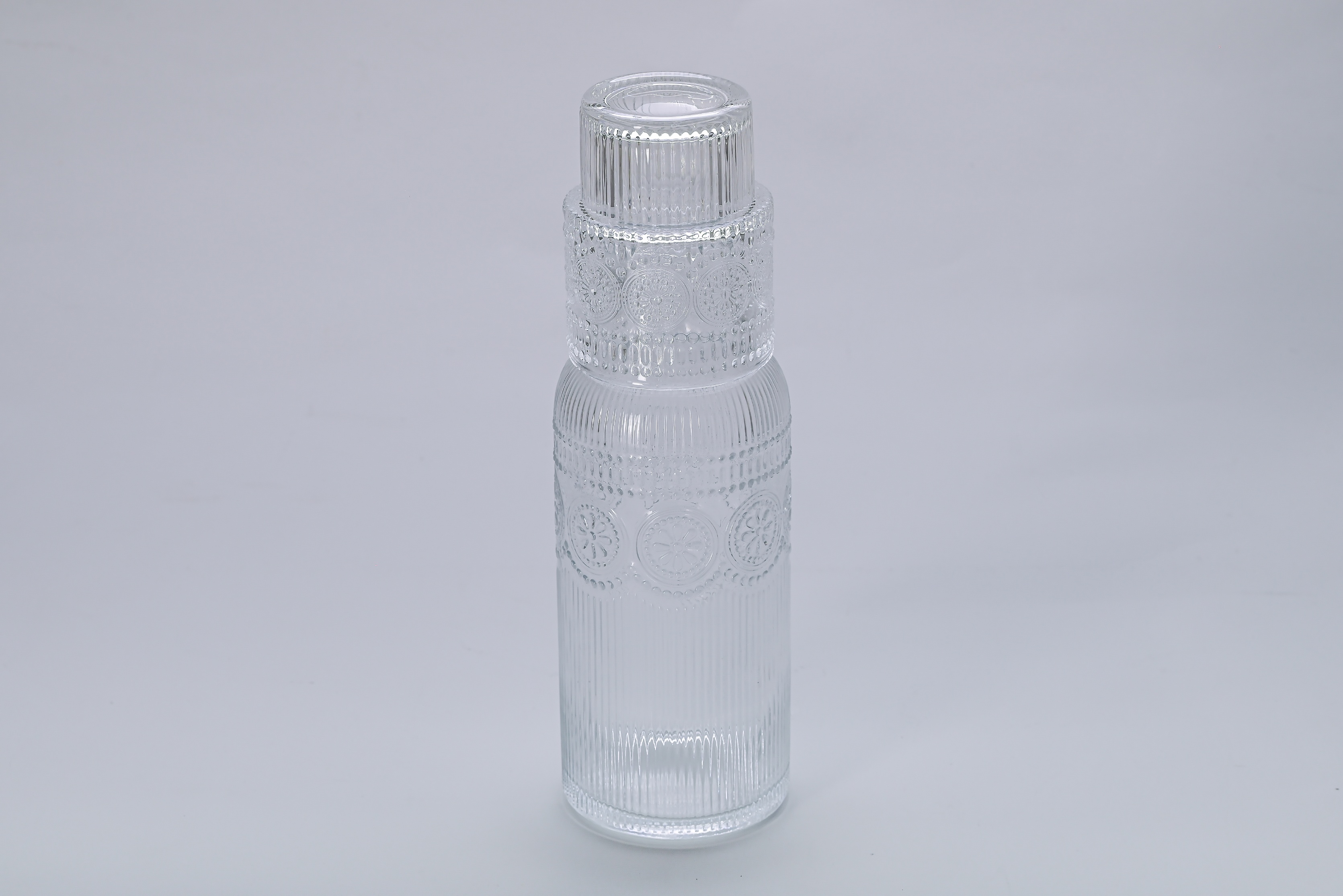 Botella de vidrio texturizada