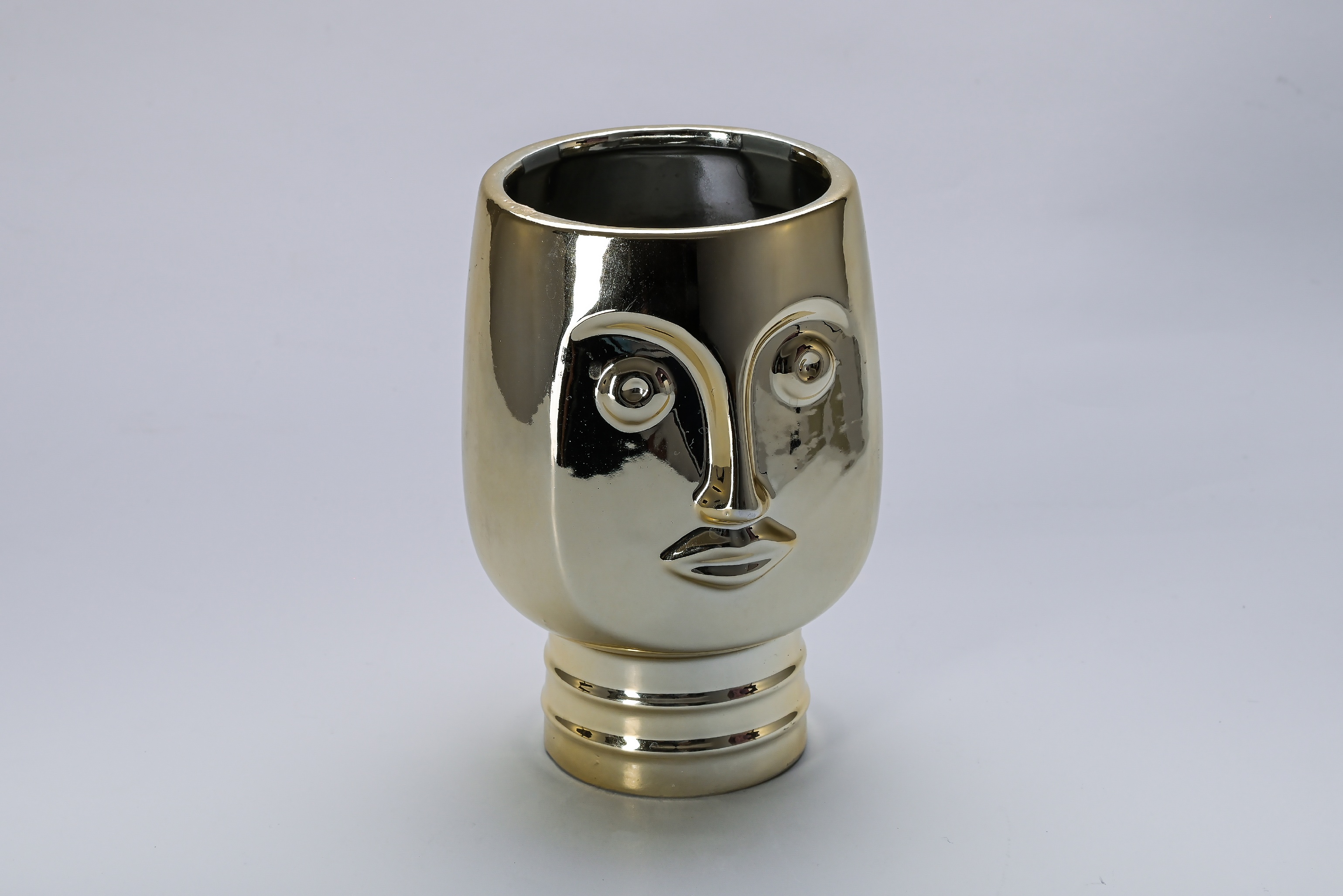 Jarron rostro dorado