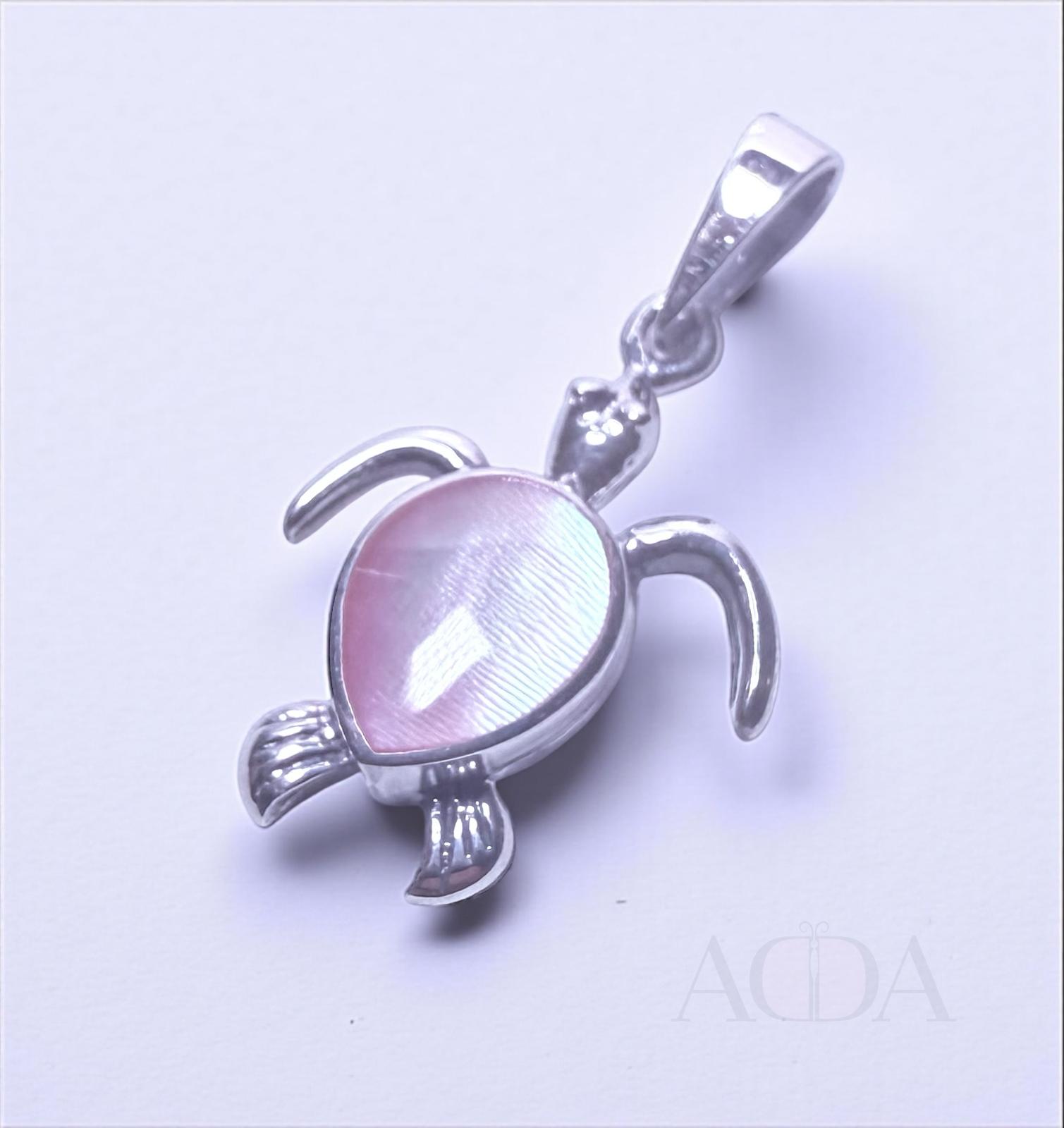 Dije tortuga de plata