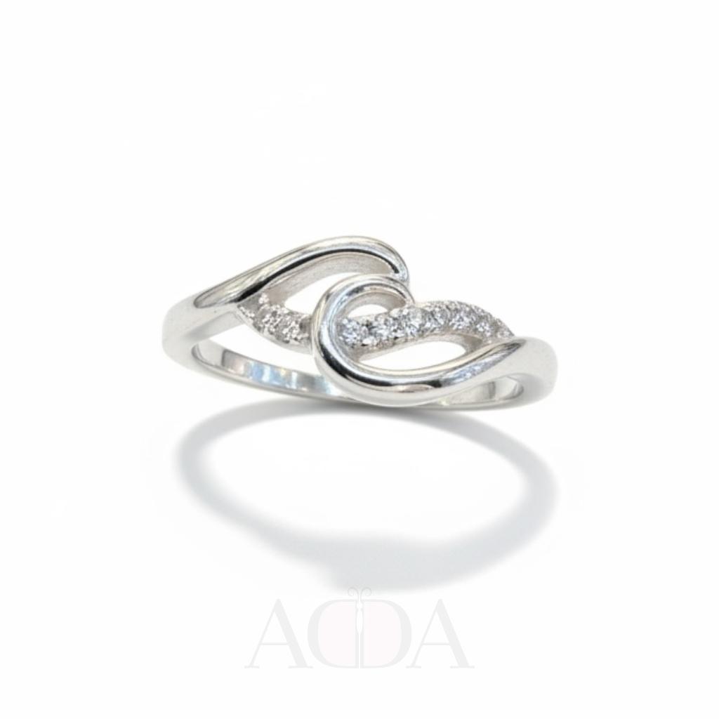 Anillo ola de plata con circonitas