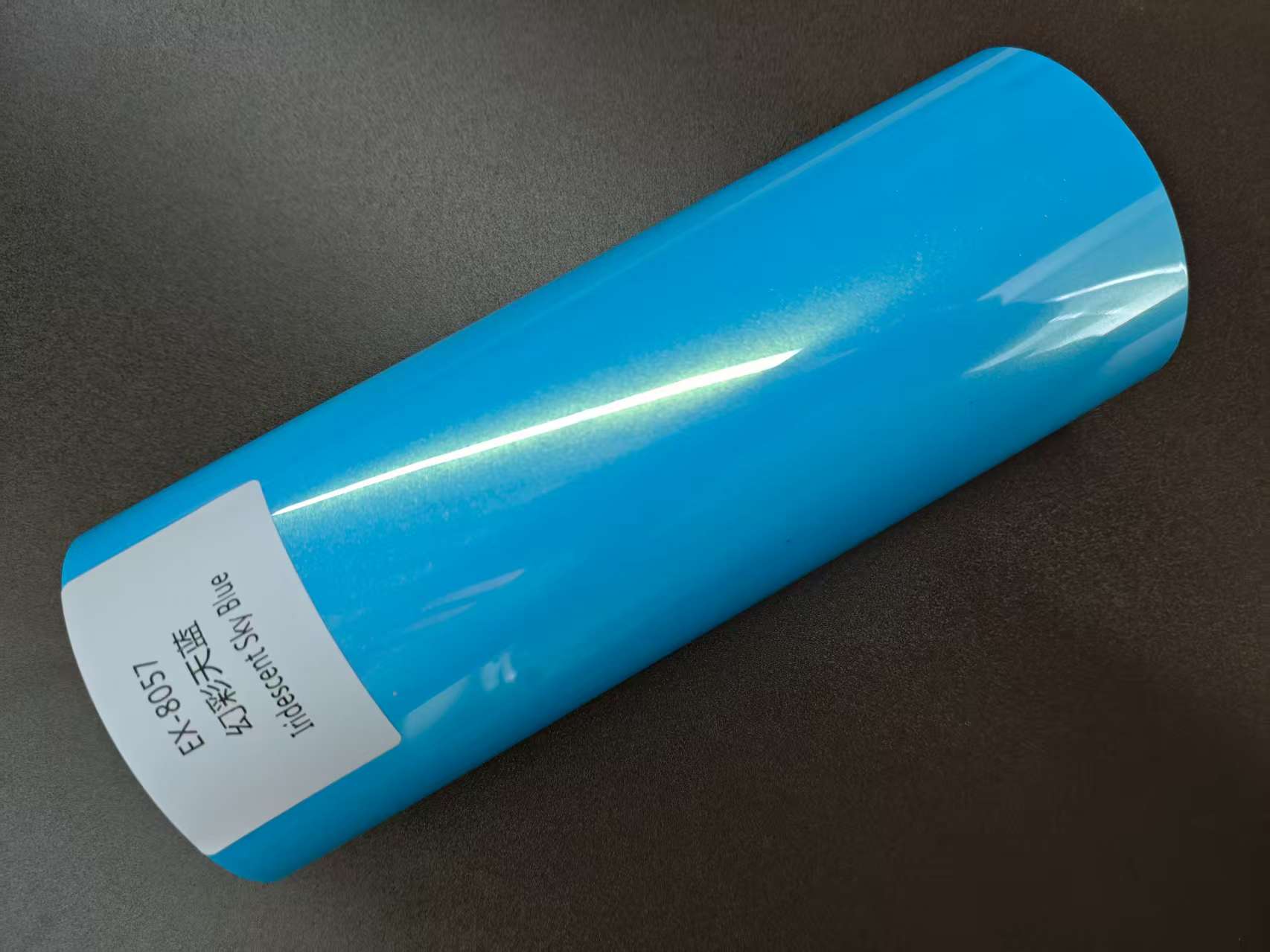 Stand out from the crowd of basic blacks and silvers – the Iridescent Sky Blue Wrap is for those who dare to be different without going over the top.