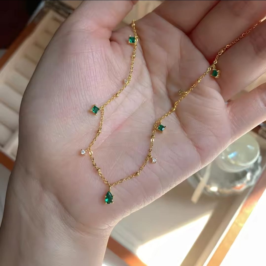 Elegant Gold Necklace with Green Gemstones