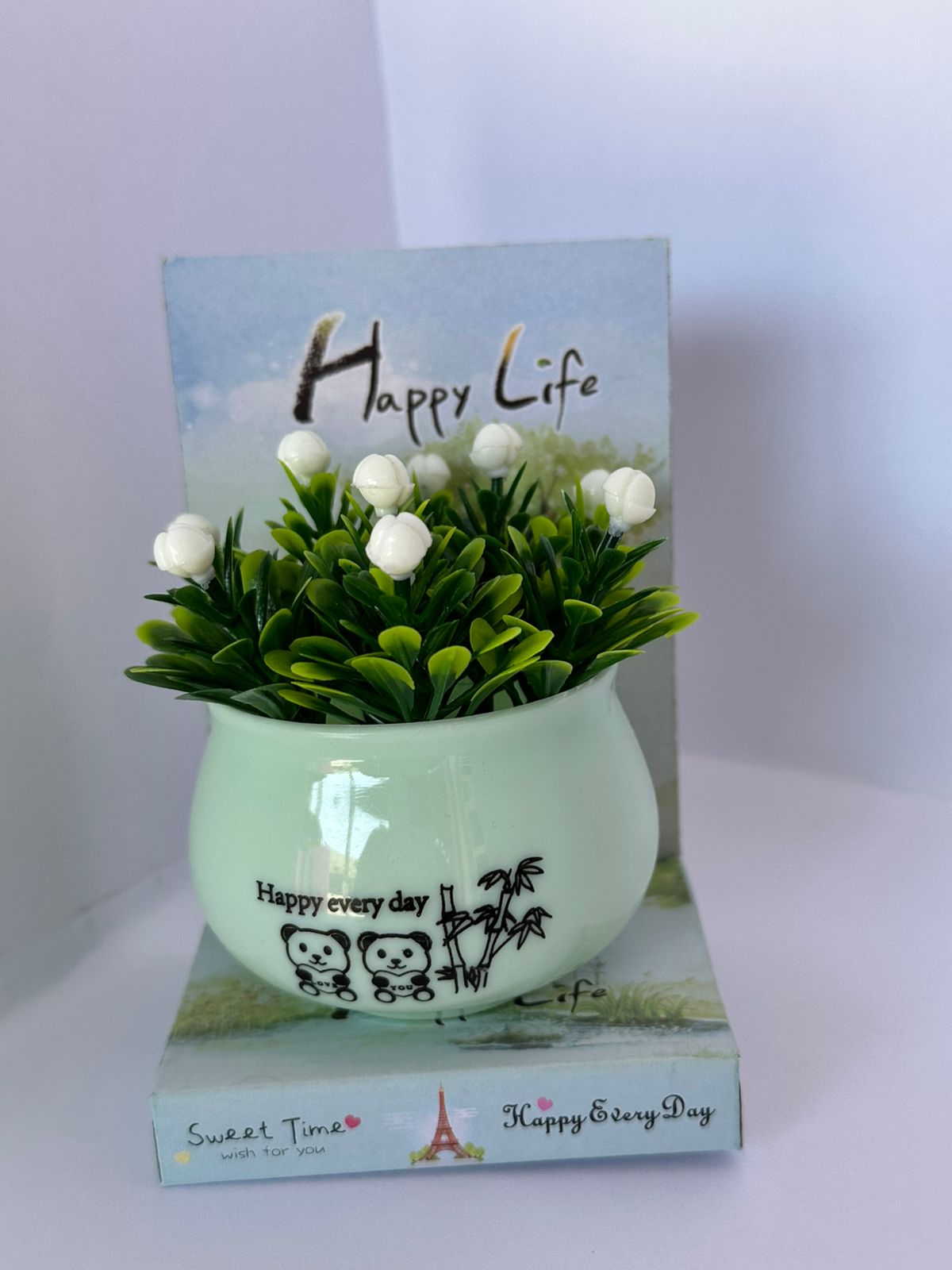 Vaso decorativo com planta artificial