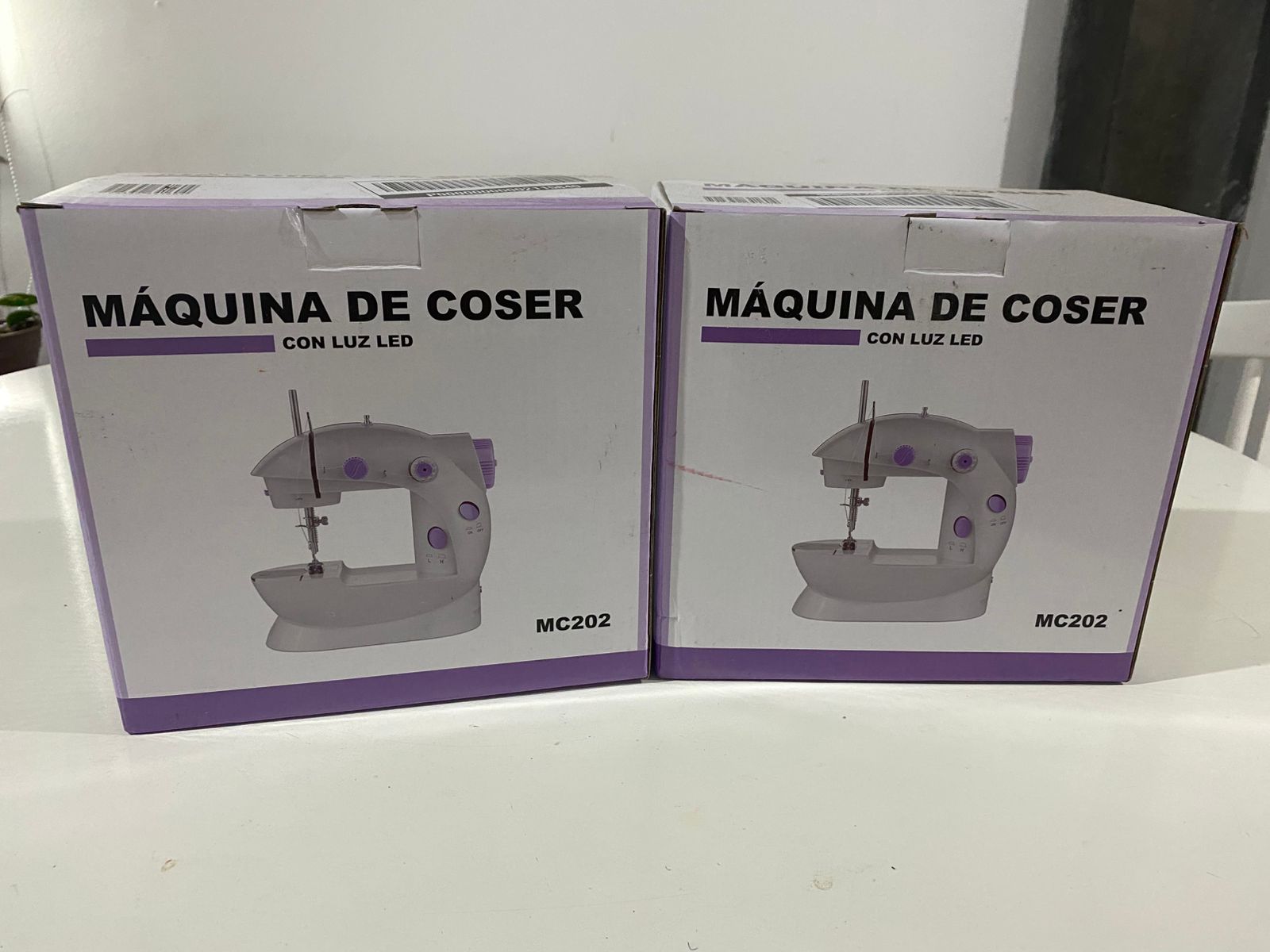 Maquina de coser mini recta con luz led
