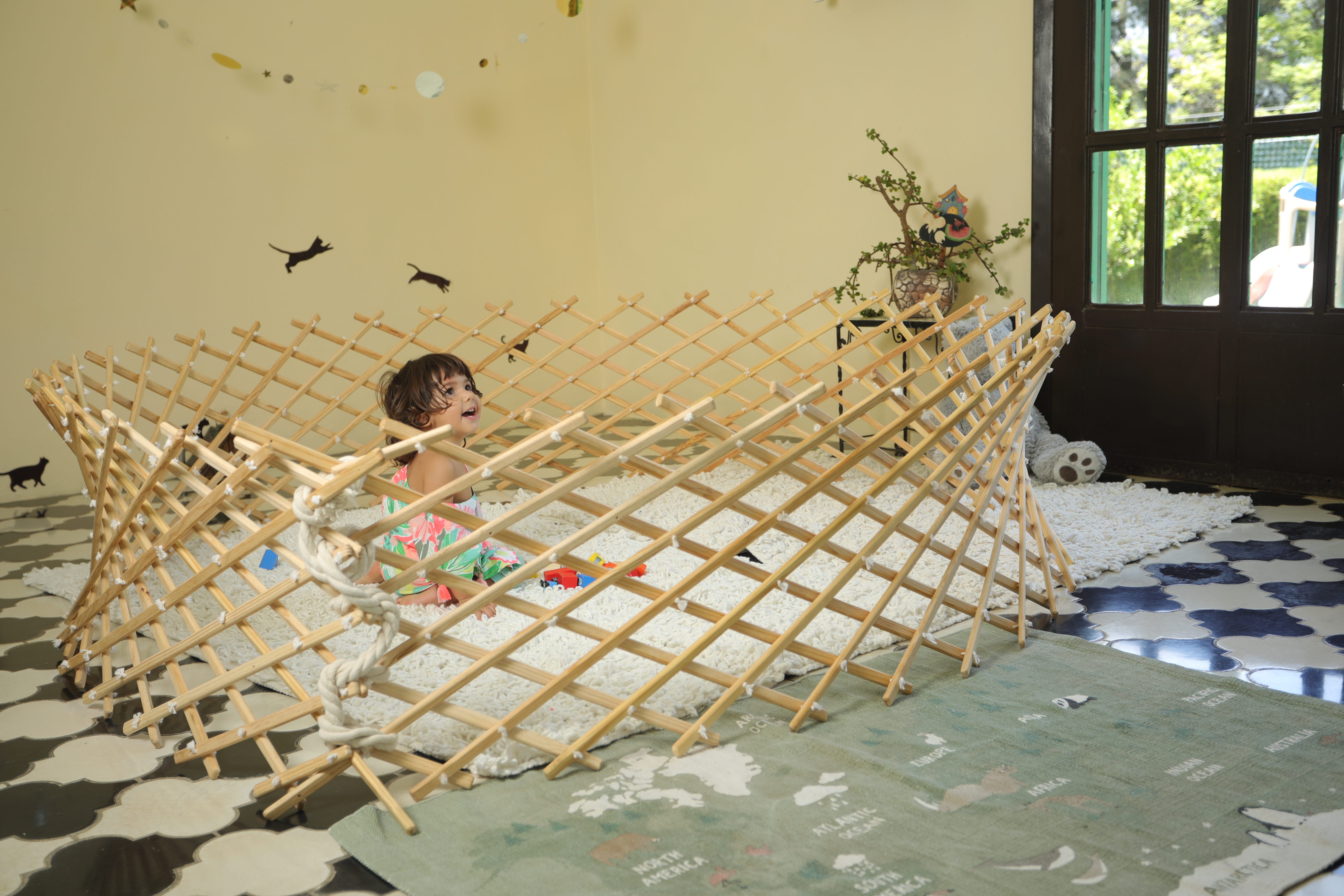 Pared de  Yurta infantil y corralito