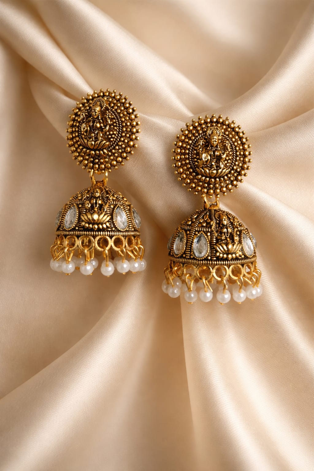 Traditional gold jhumka earrings