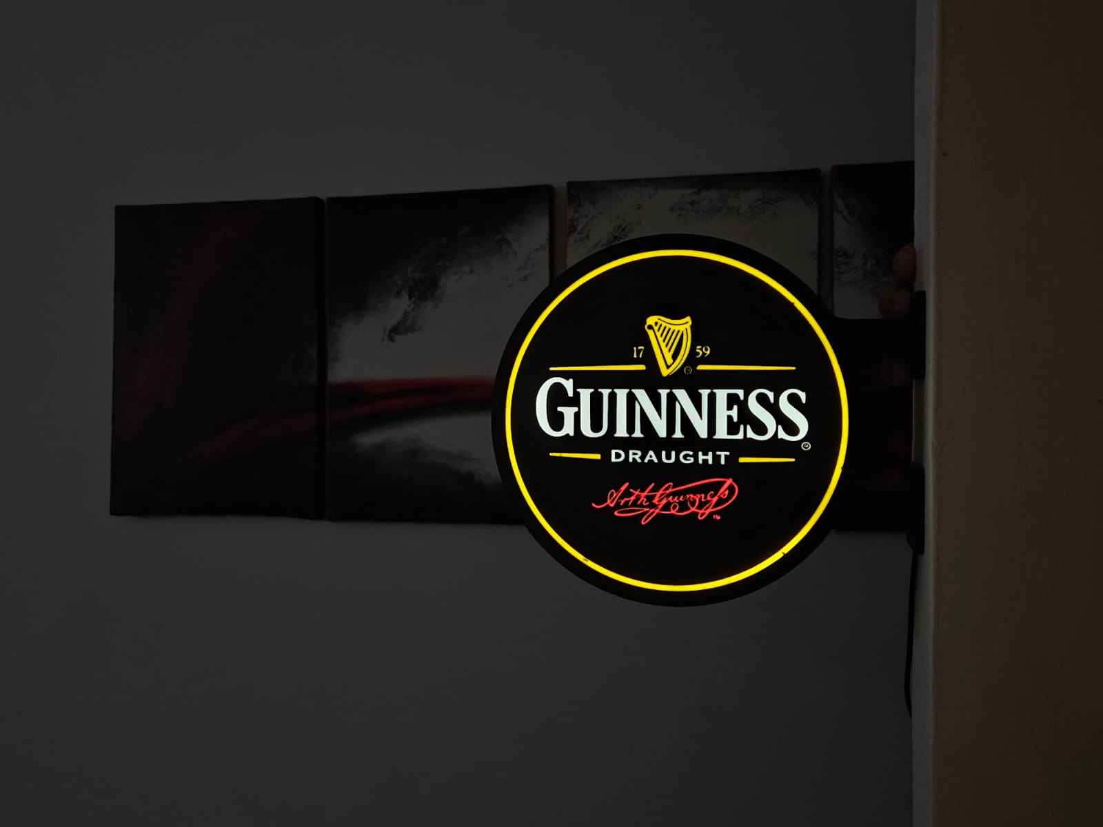 Insegna luminosa Guinness