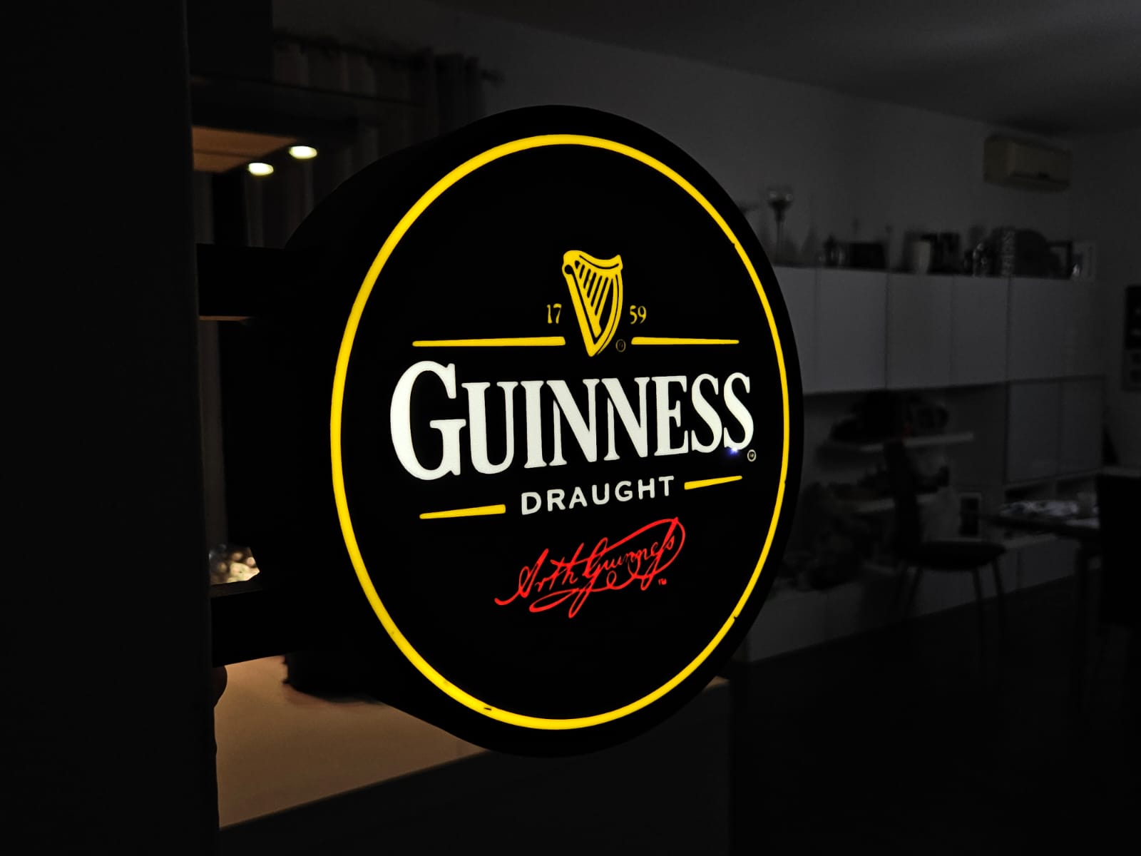 Insegna luminosa Guinness