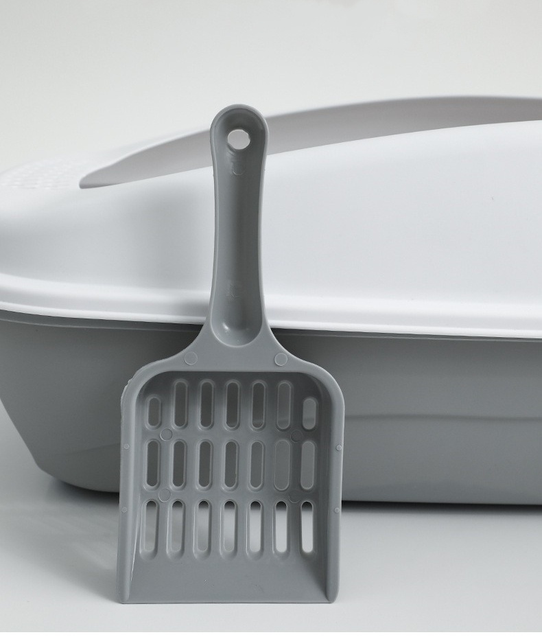 Caja de arena con pala para gatos