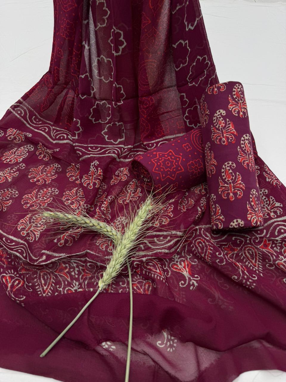 Rust Printed Chiffon Suit 1100/- +shipping