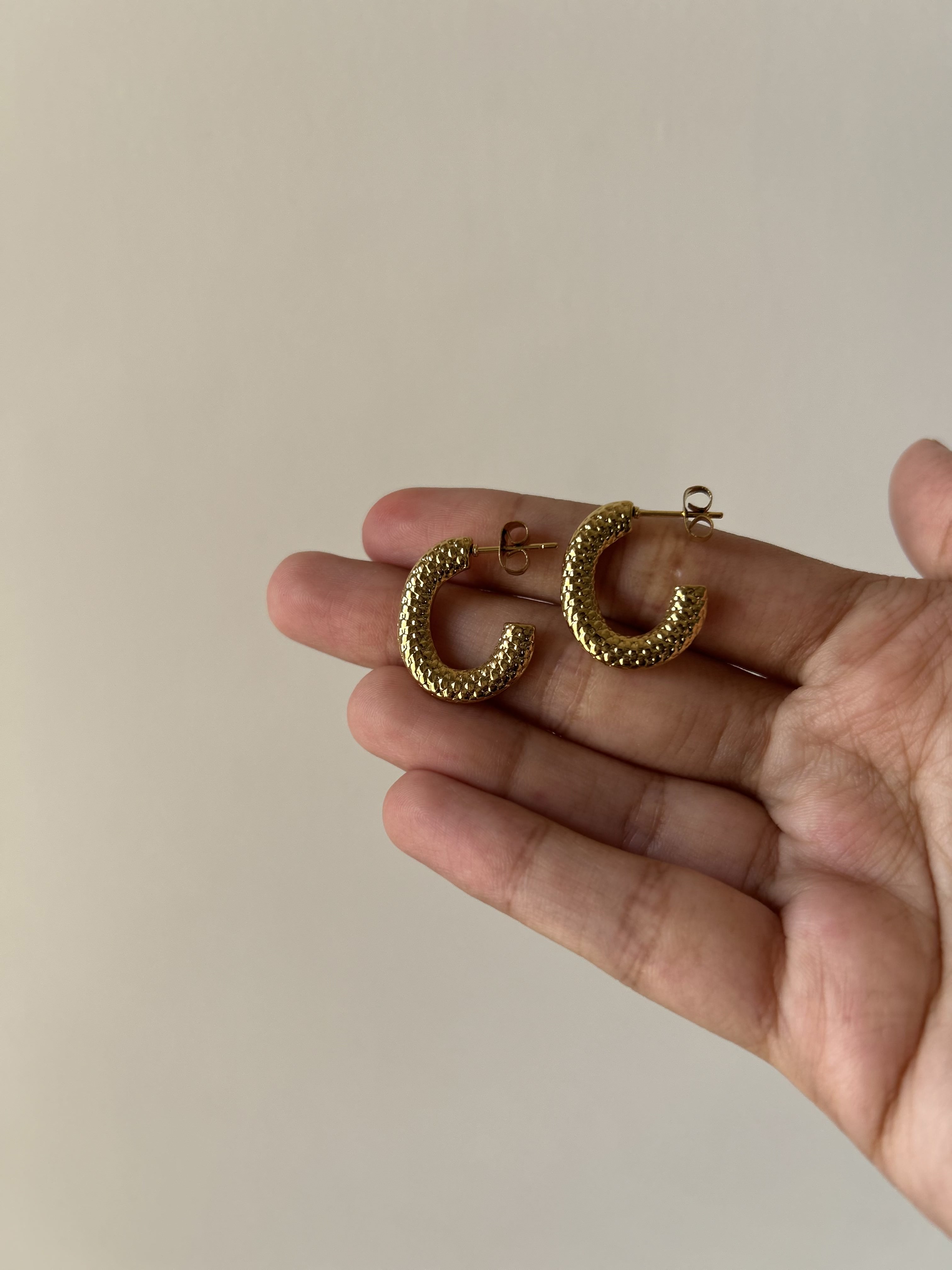 Gold-textured hoop earrings