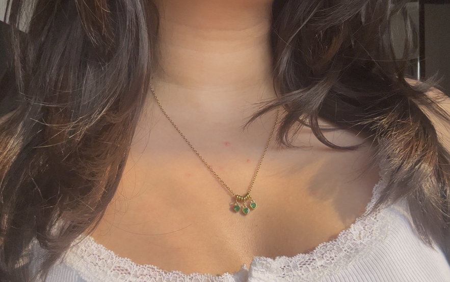 Elegant Gold Necklace with Green Gemstones