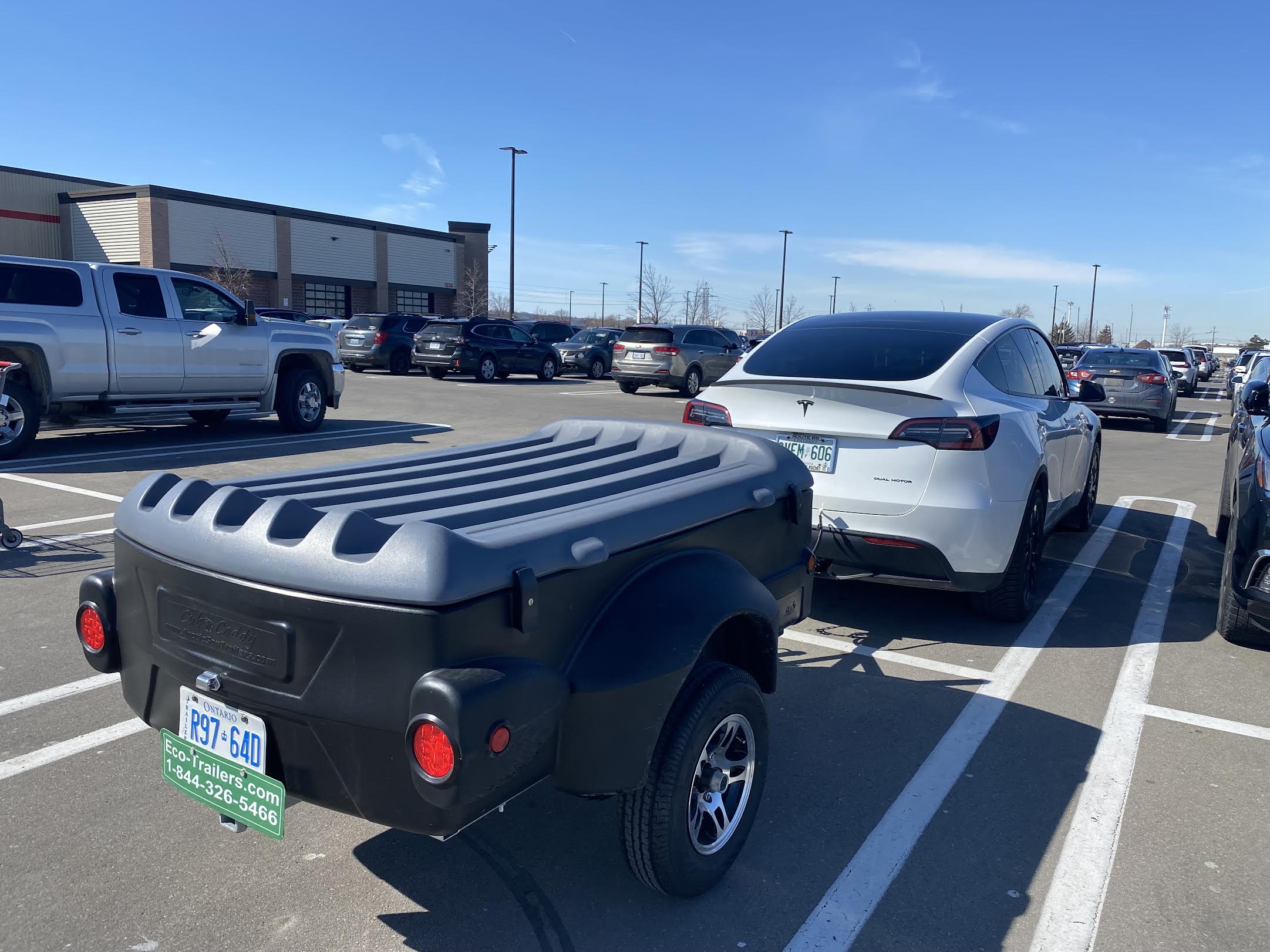 New 2025 black/grey 4x6 covered utility trailer