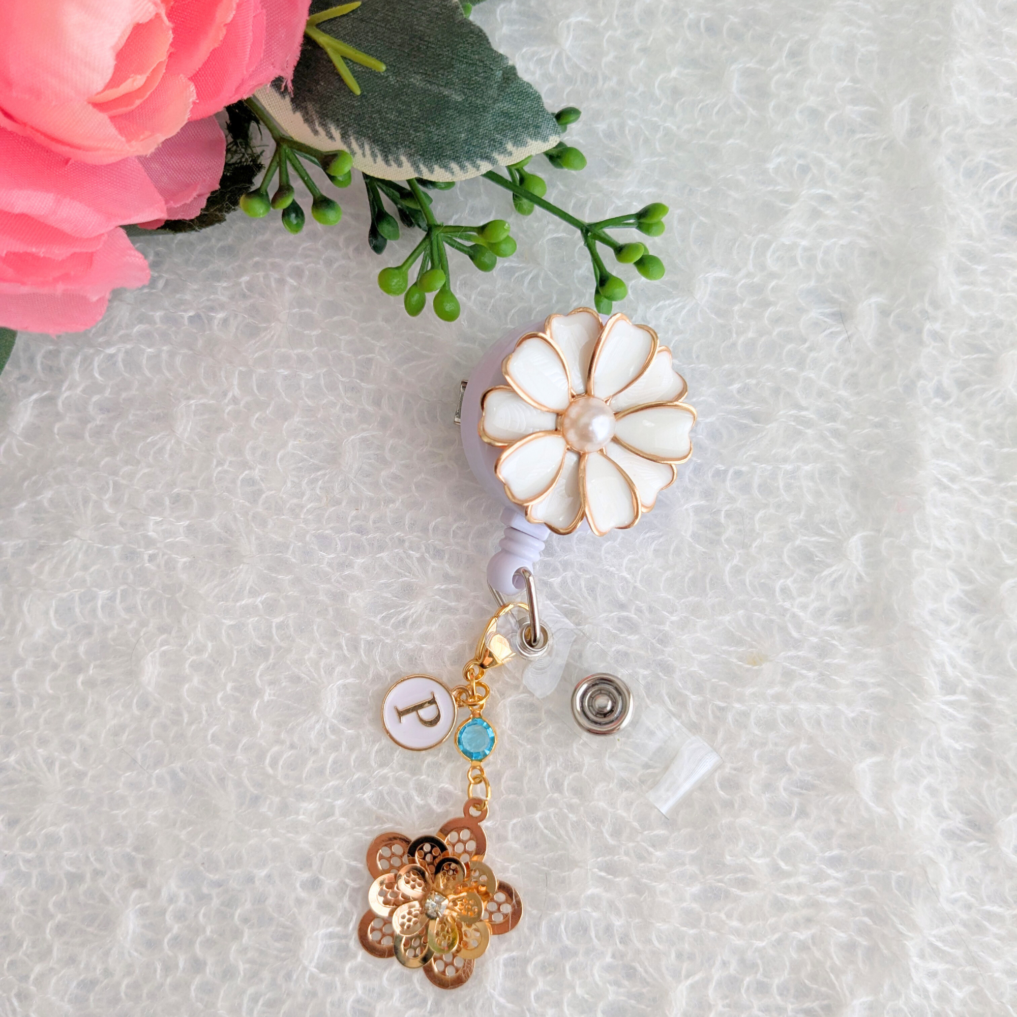 White Floral Badge Reel With Swivel Alligator Clip