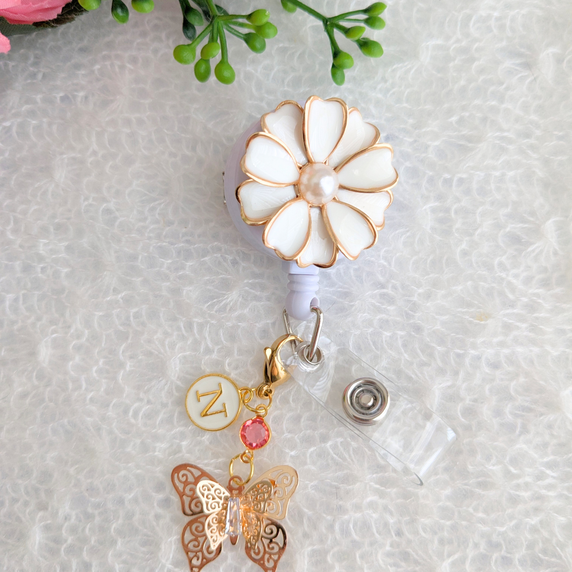 White Floral Badge Reel With Swivel Alligator Clip