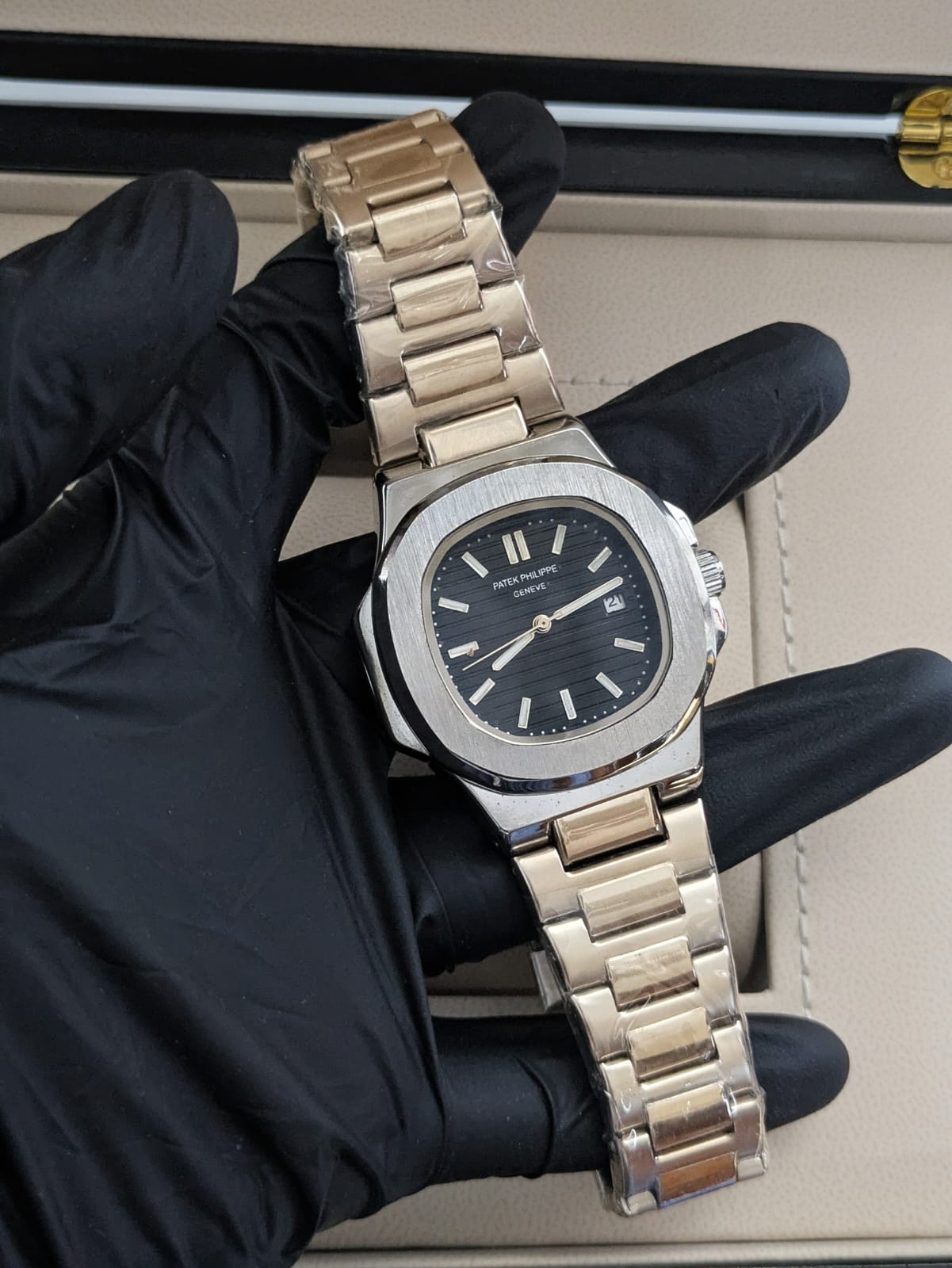 Patek Philippe Nautilus - Stainless Steel, Black Dial, Date and Master Lock