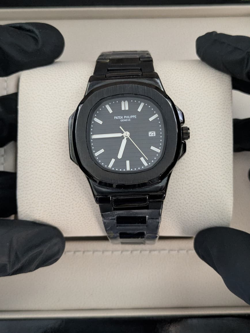 Patek Philippe Nautilus - Stainless Steel, Black Dial, Date and Master Lock
