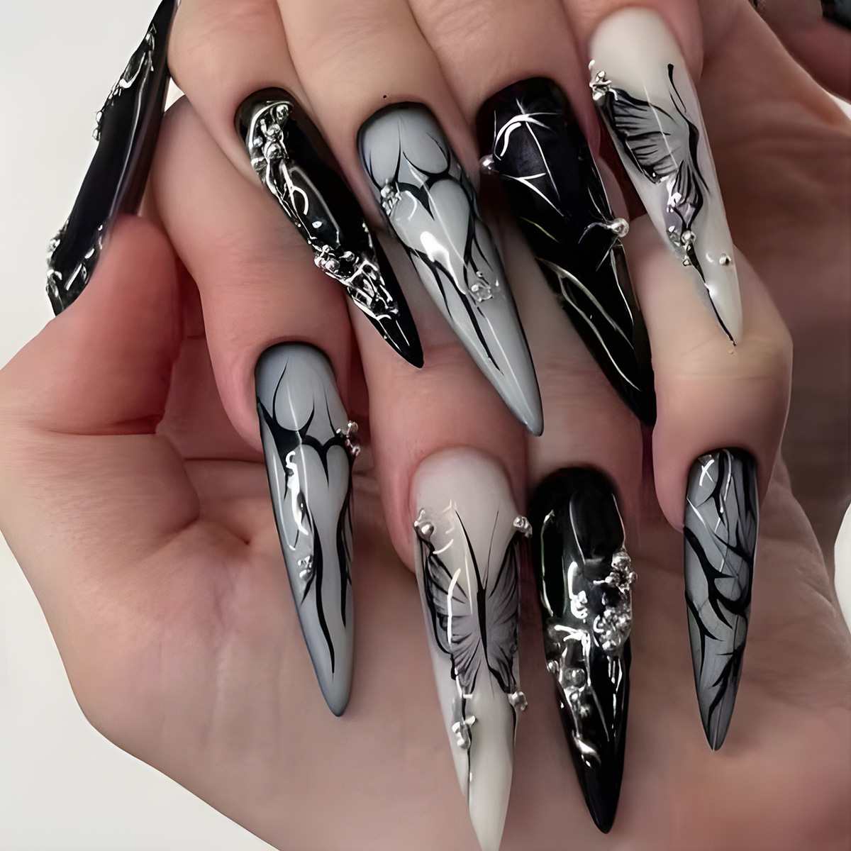 Dark, edgy, and cool punk style European and American nail art tips with heart and butterfly designs; wearable false nails, wholesale for cross-border e-commerce.