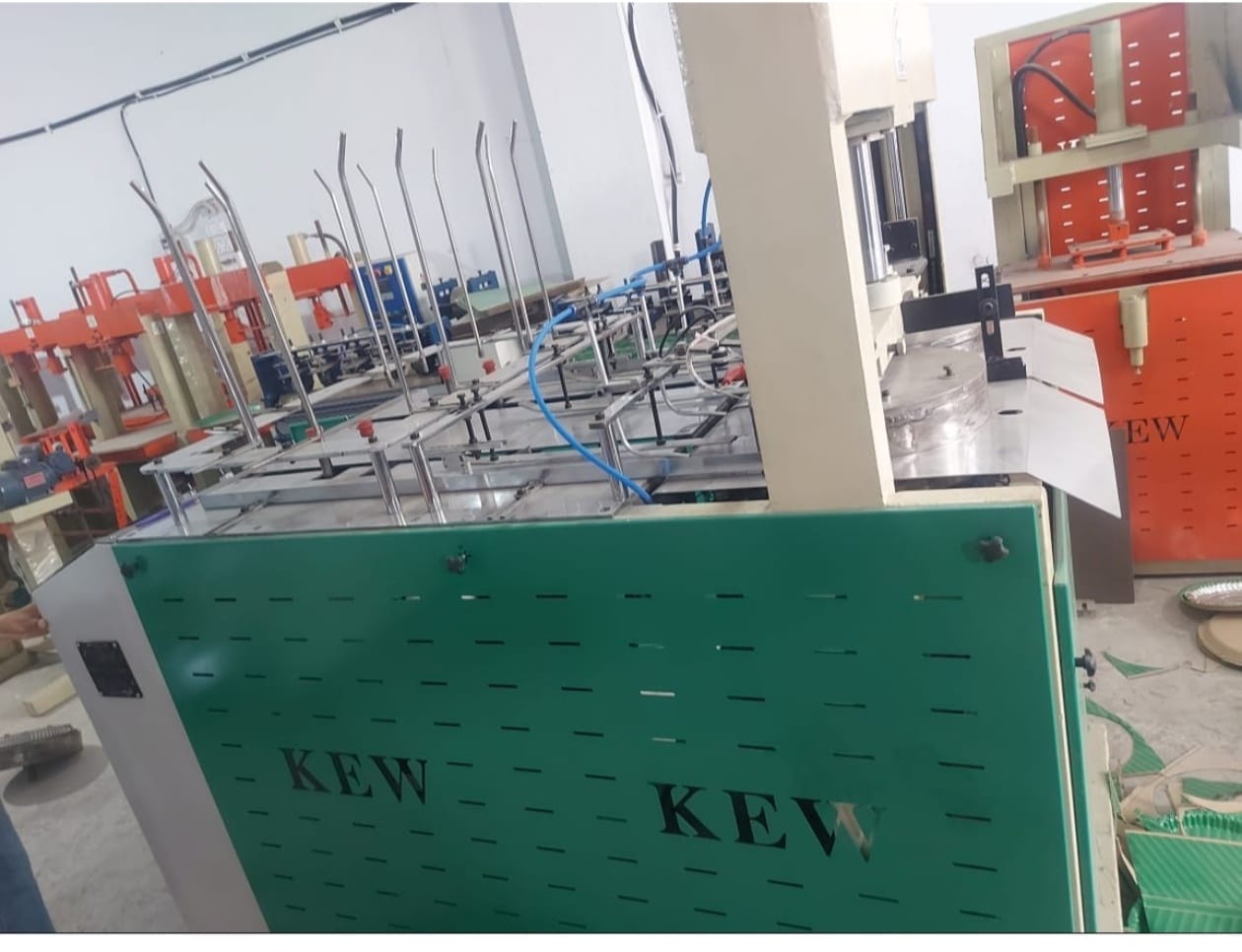 AUTOMATIC BUFFER PLATE MACHINE