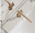 Cream colored Faucet splash mat 