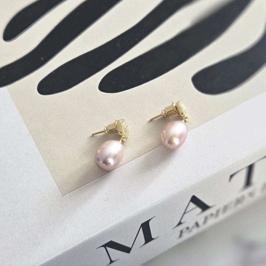 Éclat d’Or – Boucles d’oreilles raffinées 