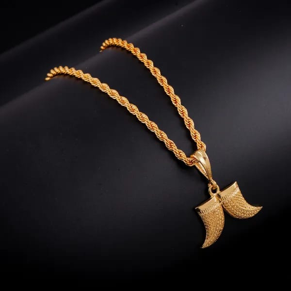 Gold whale tail necklace
