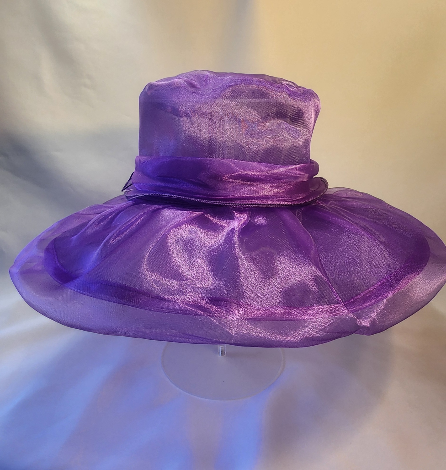 Elegant Purple Hat keeps you cool in Church