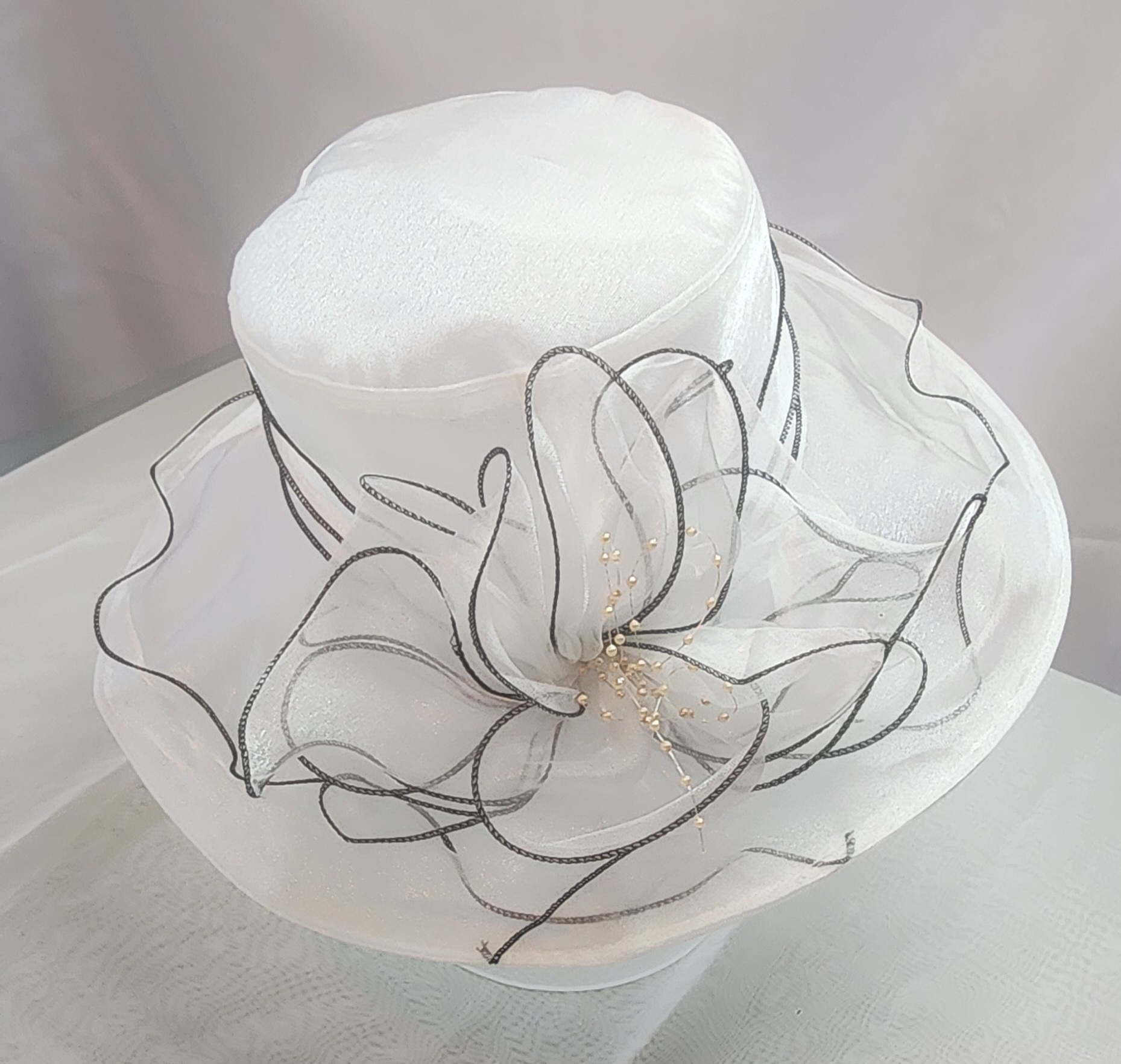 Elegant White Hat keeps you cool in Church